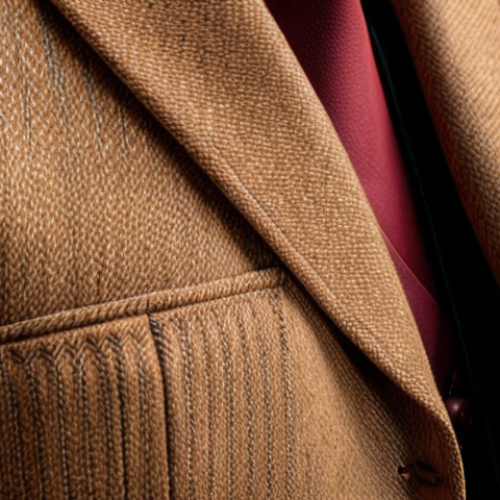 **

Prompt: Luxurious Loro Piana suit, vicuna wool texture close-up, classic design, sophisticated, high-quality fabric detail, elegant tailoring.

**